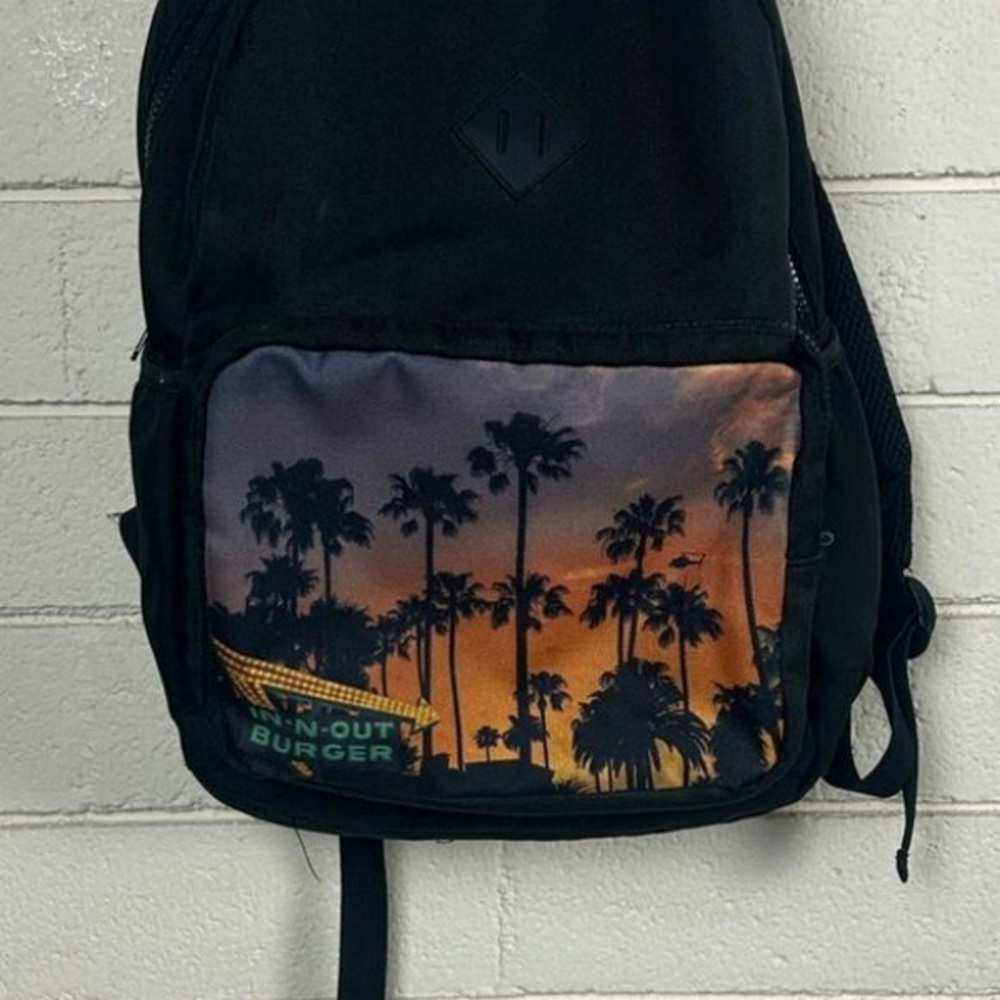 Black Backpack With Sunset Design - image 1